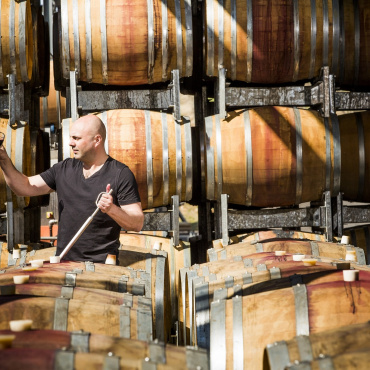 Ben tasting barrels