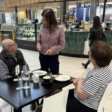 Cressida O'Hanlon talking with local residents in Norwood Place